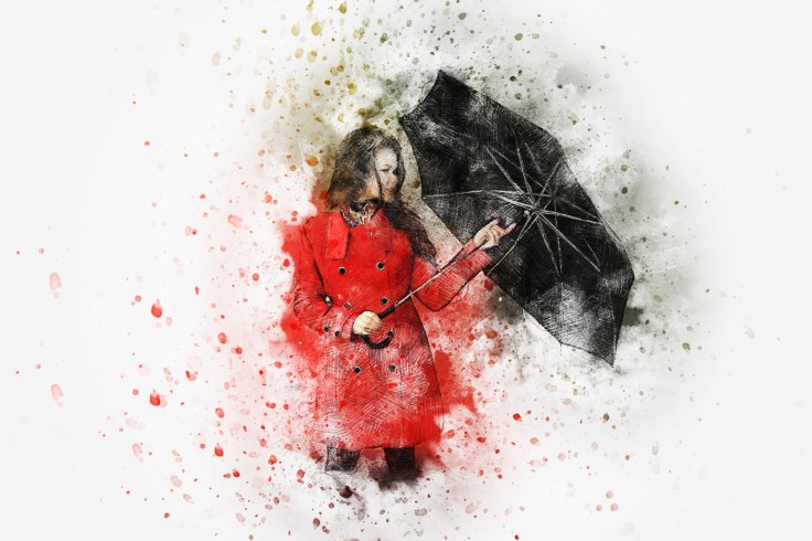 a woman in a red coat holding a black umbrella