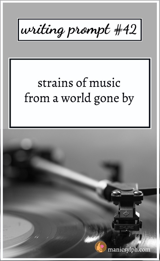 Vinyl record playing and writing prompt 42 written on it