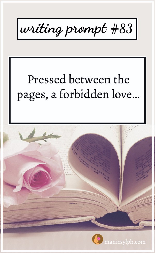 A pink rose kept in an open book; writing prompt 83 "Pressed between the pages, a forbidden love…" written on it.