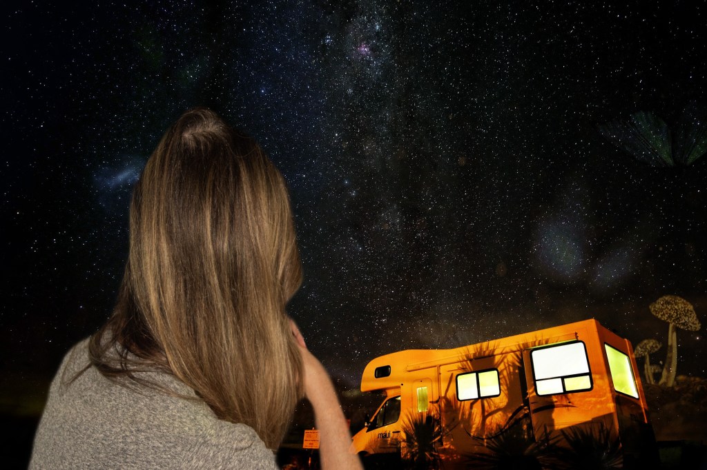 A woman thinking, against a night background