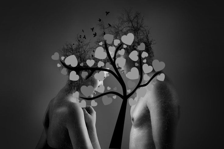 Man and woman behind a tree of hearts- digitally edited picture
