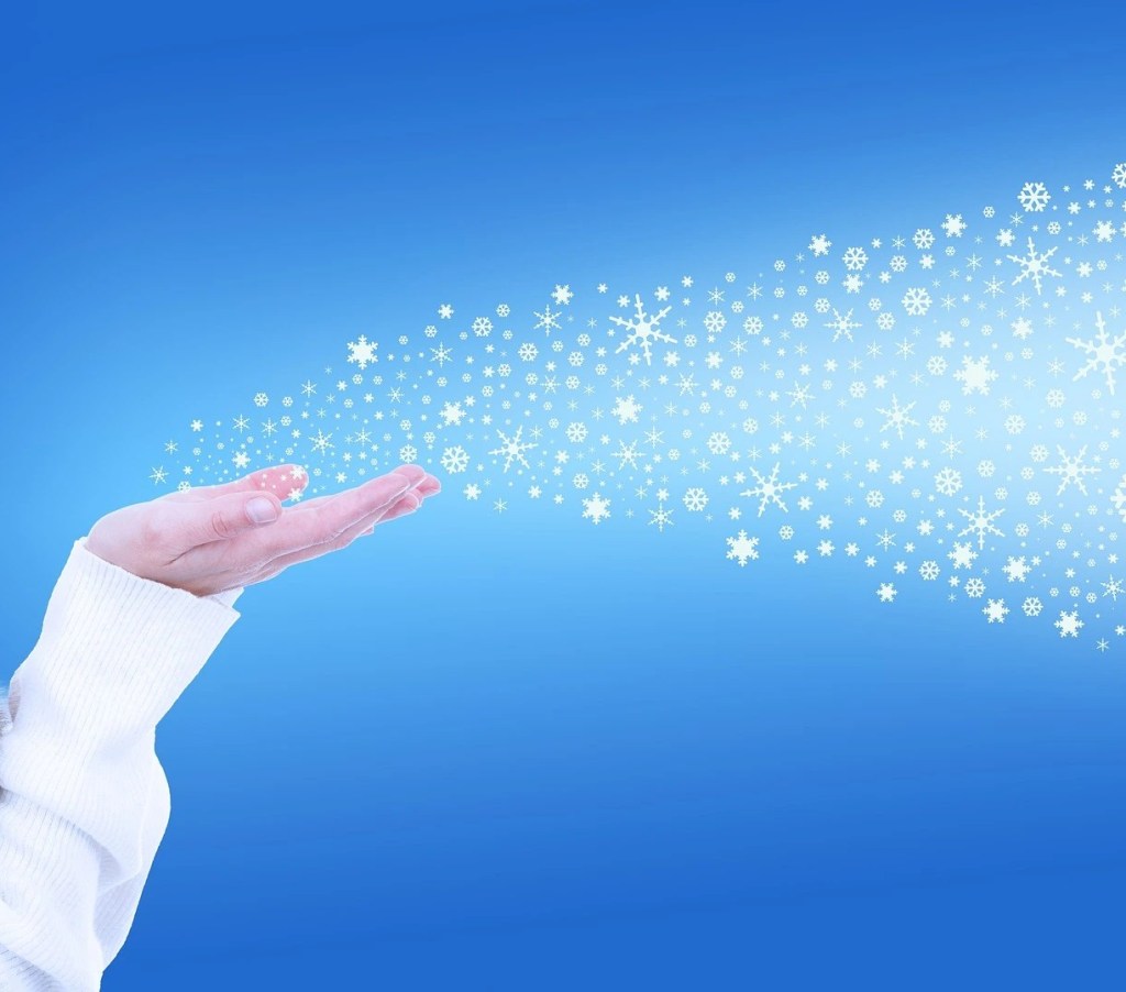 Snow pouring out of hands