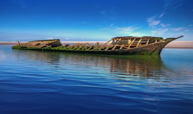 An old wooden boat floating